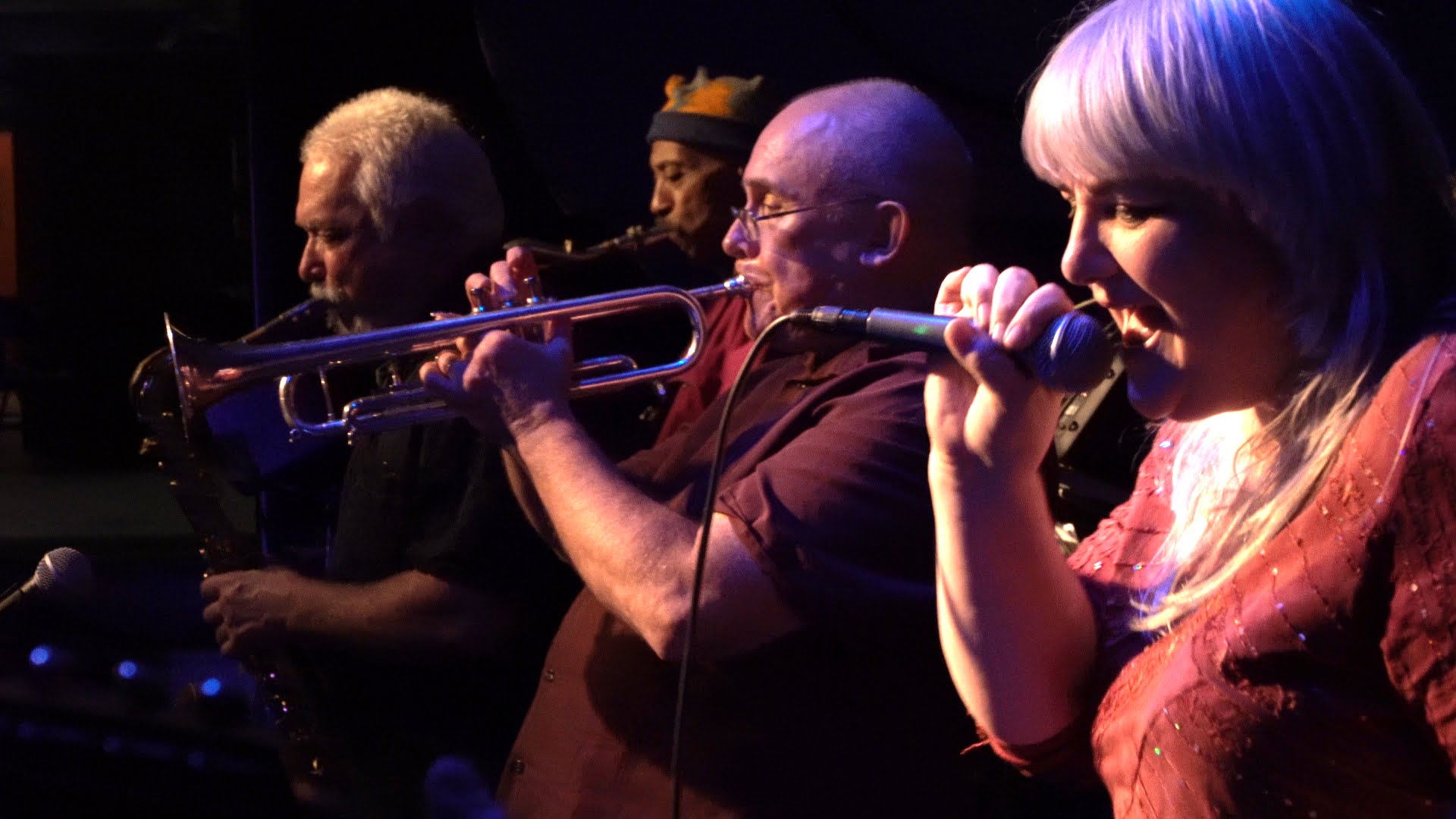 Trumpet, sax, and vocals up close